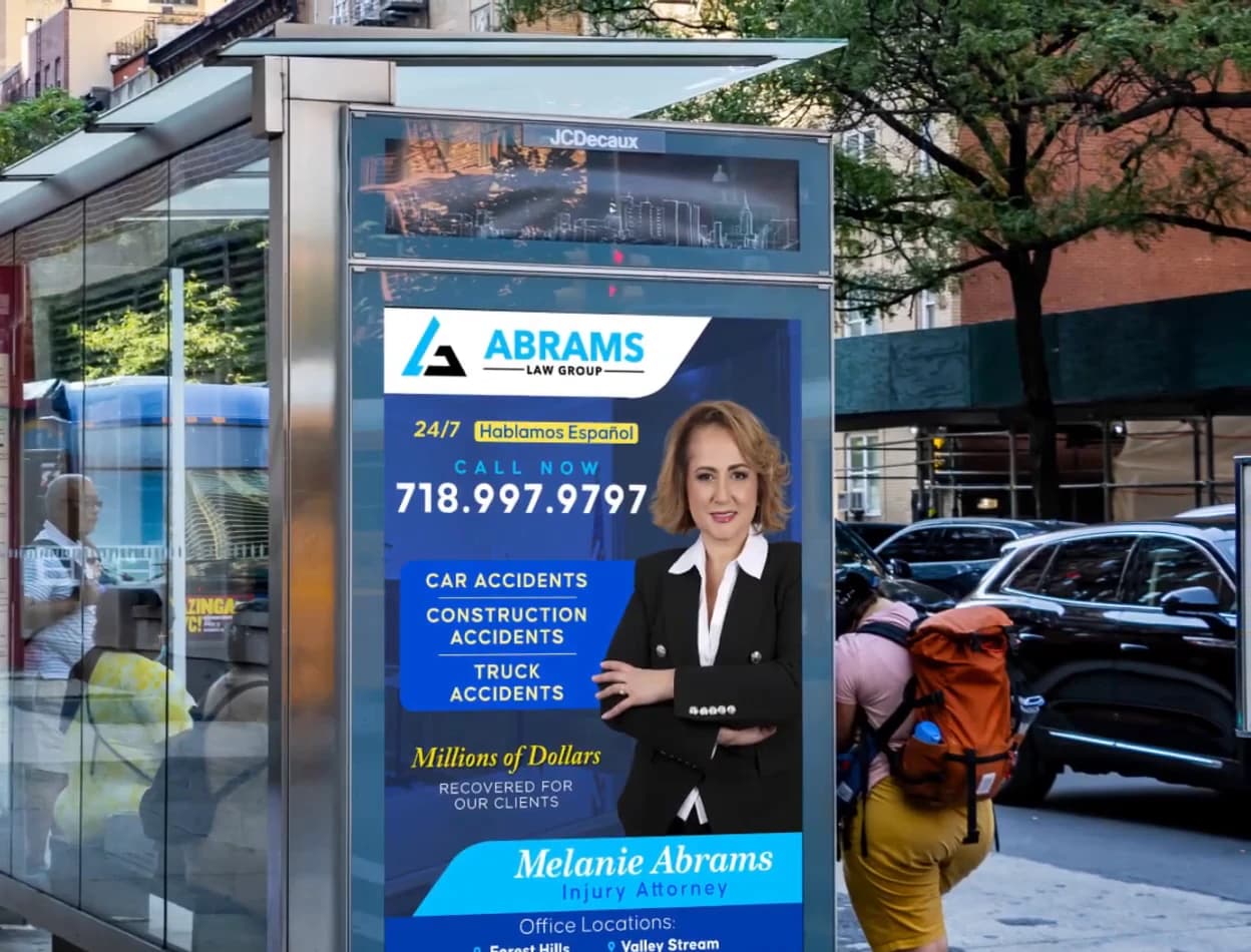 Law firm advertisement on an NYC bus shelter panel